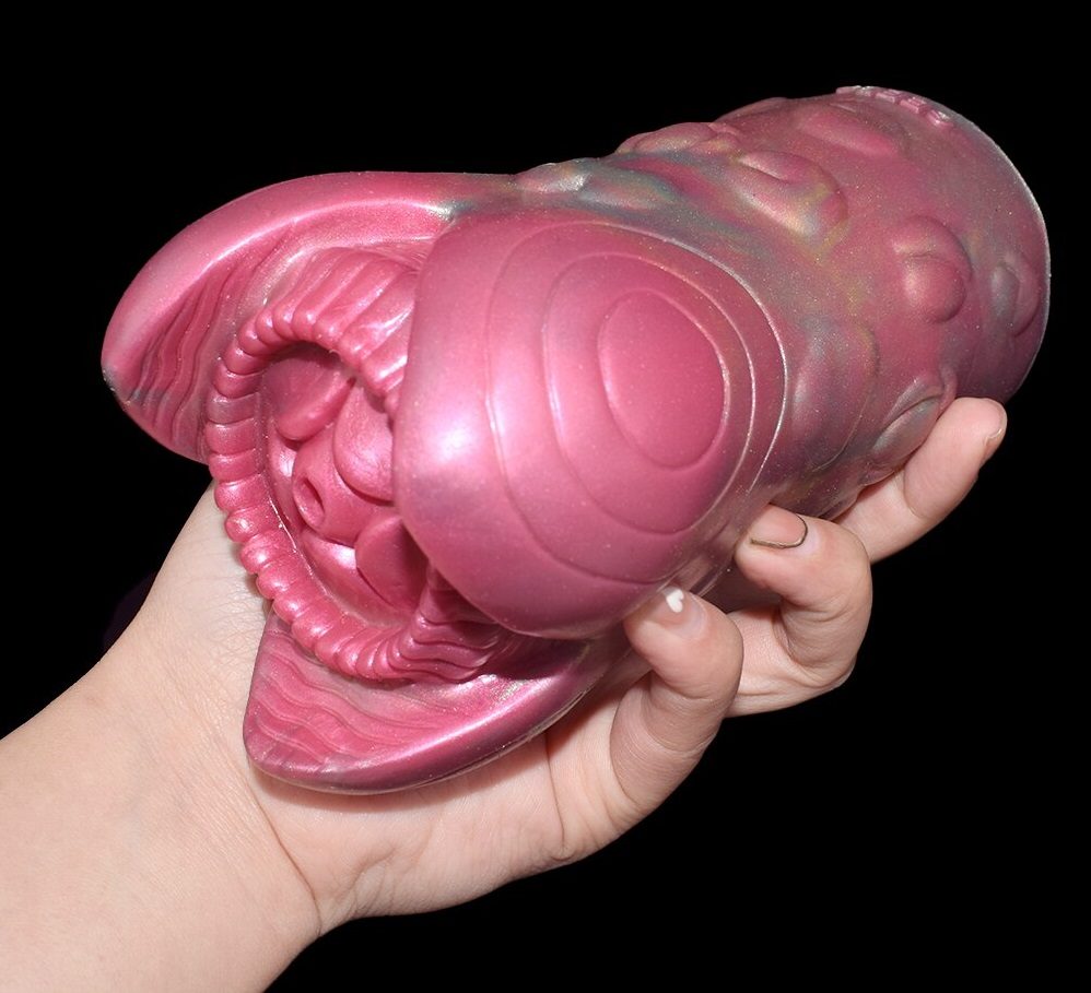 Material: Liquid silicone
Size: 7*15.5cm
Net weight: 656.5g FAAK - Sandworm Masturbator - Pink photo-9