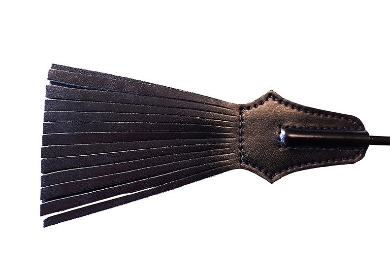 This robust riding crop features a sturdy and flexible shaft... Rouge - Leather Tasselled Riding Crop - Black photo-3