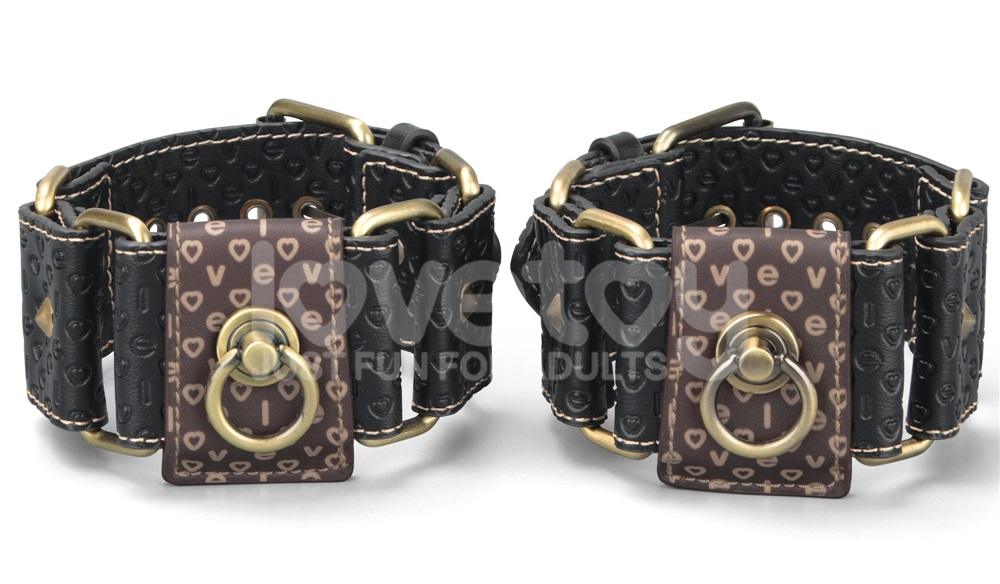 Immerse yourself in a blend of luxury and rustic charm with ... Lovetoy - Rebellion Reign Ankle Cuffs - Black photo-4