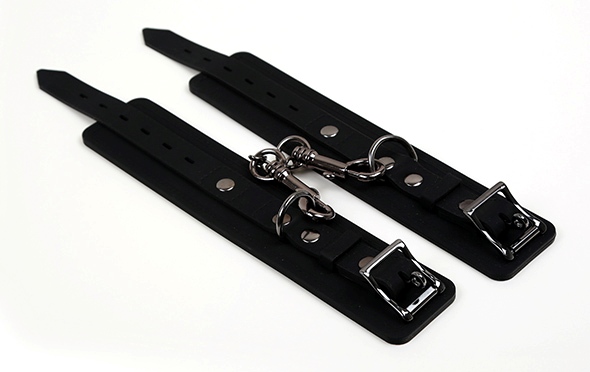 Heavy duty silicone cuffs with polished gunmetal clips. Thes... Pornhub - Silicone Handcuffs - Black photo-5