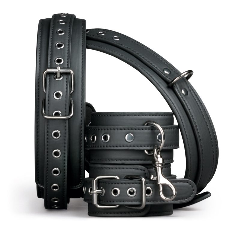 With this special thigh and wrist cuff set, you can tie your... Easytoys - Cuff Restraint Set - Black photo-3