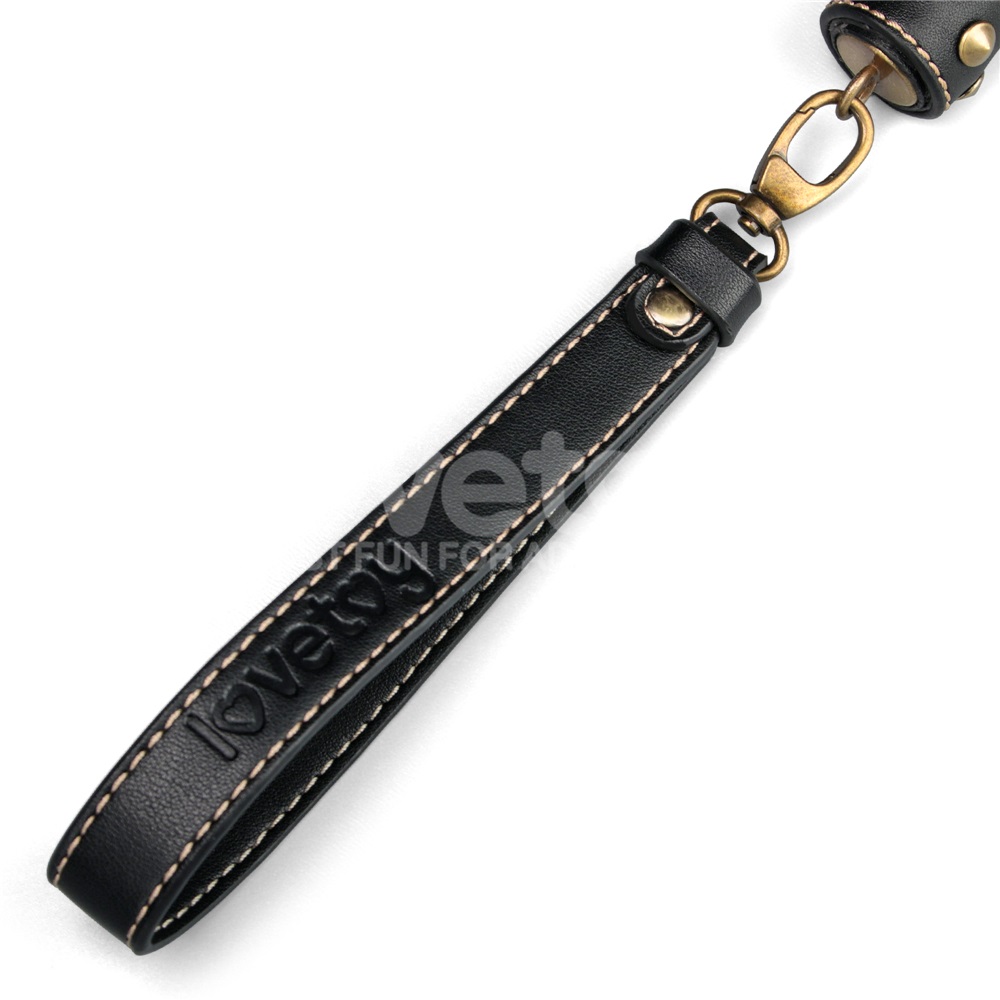 Immerse yourself in a blend of luxury and rustic charm with ... Lovetoy - Rebellion Reign Flogger - Black/Beige photo-10