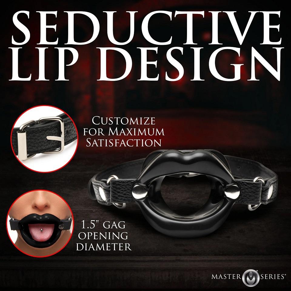 Excellent for sissy and bimbo play, this humiliating accesso... Master Series - Juicy Lips Open Mouth Gag - Black photo-3