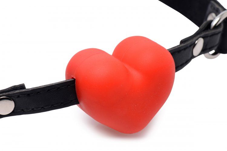 Keep your lover quiet with a sexy heart-shaped gag that allo... Frisky - Heart Beat Silicone Mouth Gag - Red photo-3