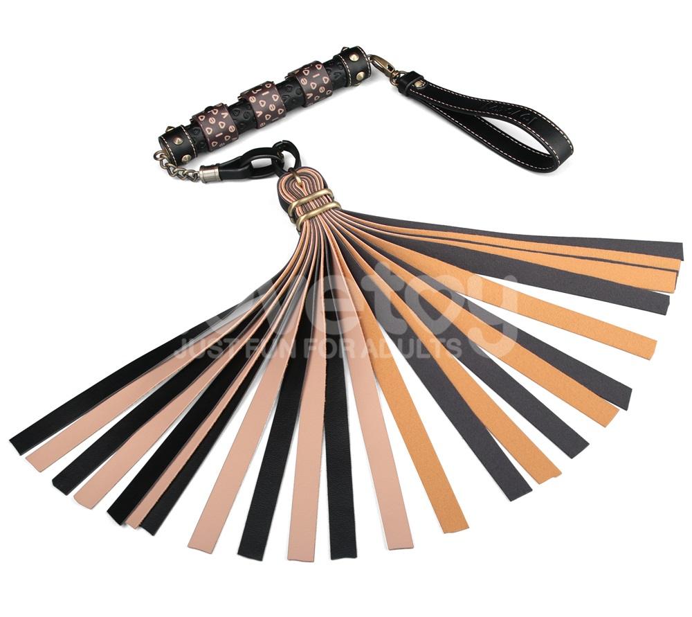 Immerse yourself in a blend of luxury and rustic charm with ... Lovetoy - Rebellion Reign Flogger - Black/Beige photo-4